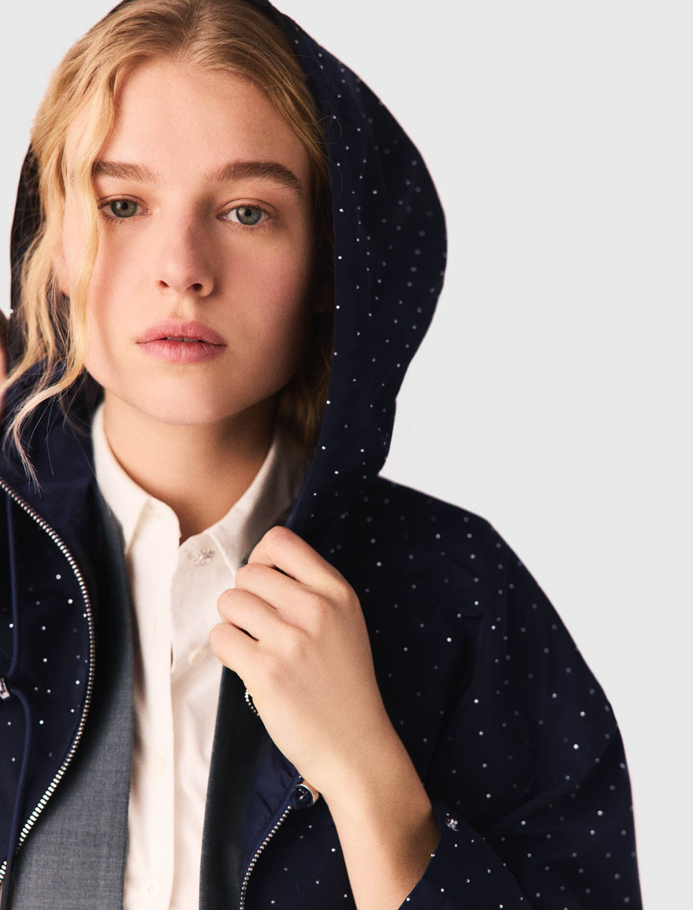 Maje Online / Hooded windbreaker with rhinestones