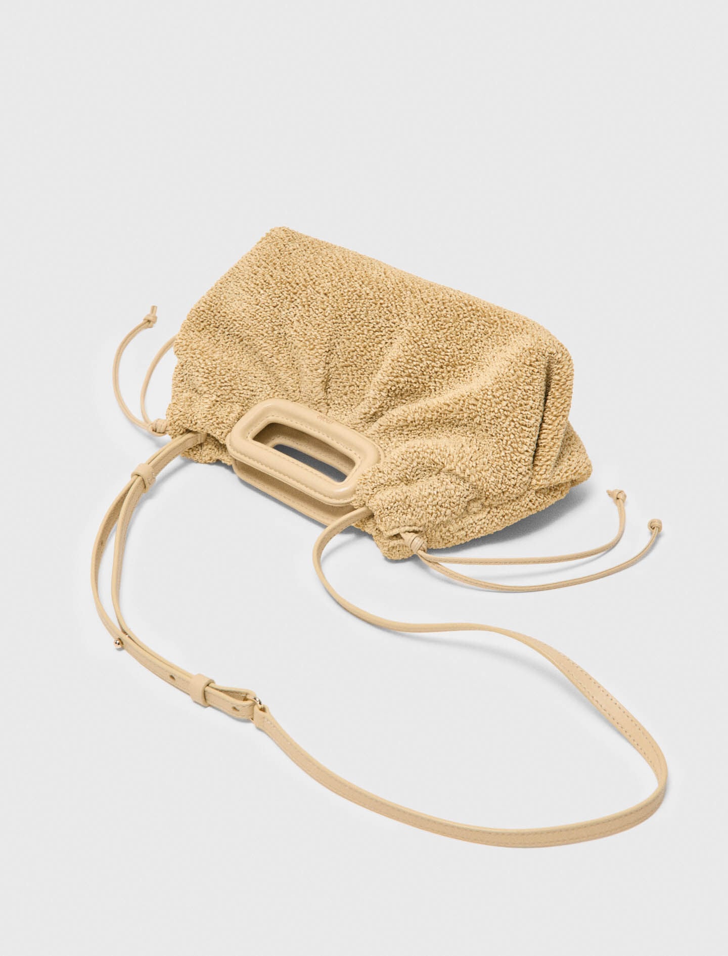 Maje New / Mipli bouclé effect clutch bag