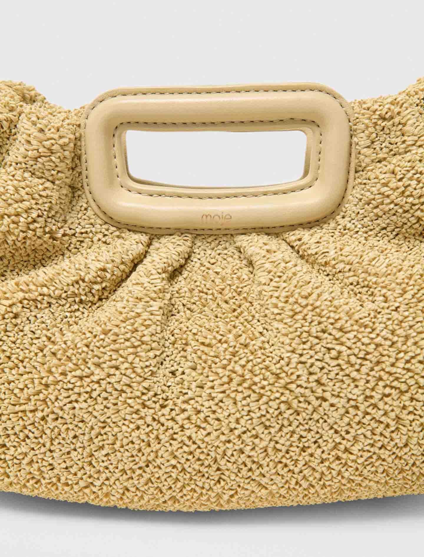 Maje New / Mipli bouclé effect clutch bag