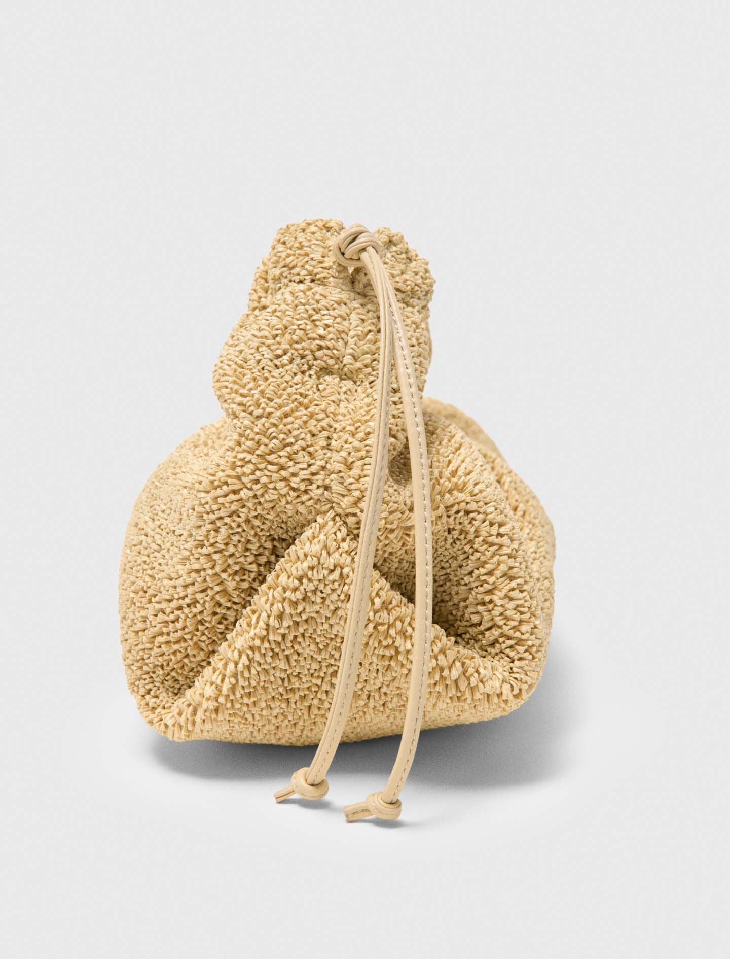 Maje New / Mipli bouclé effect clutch bag