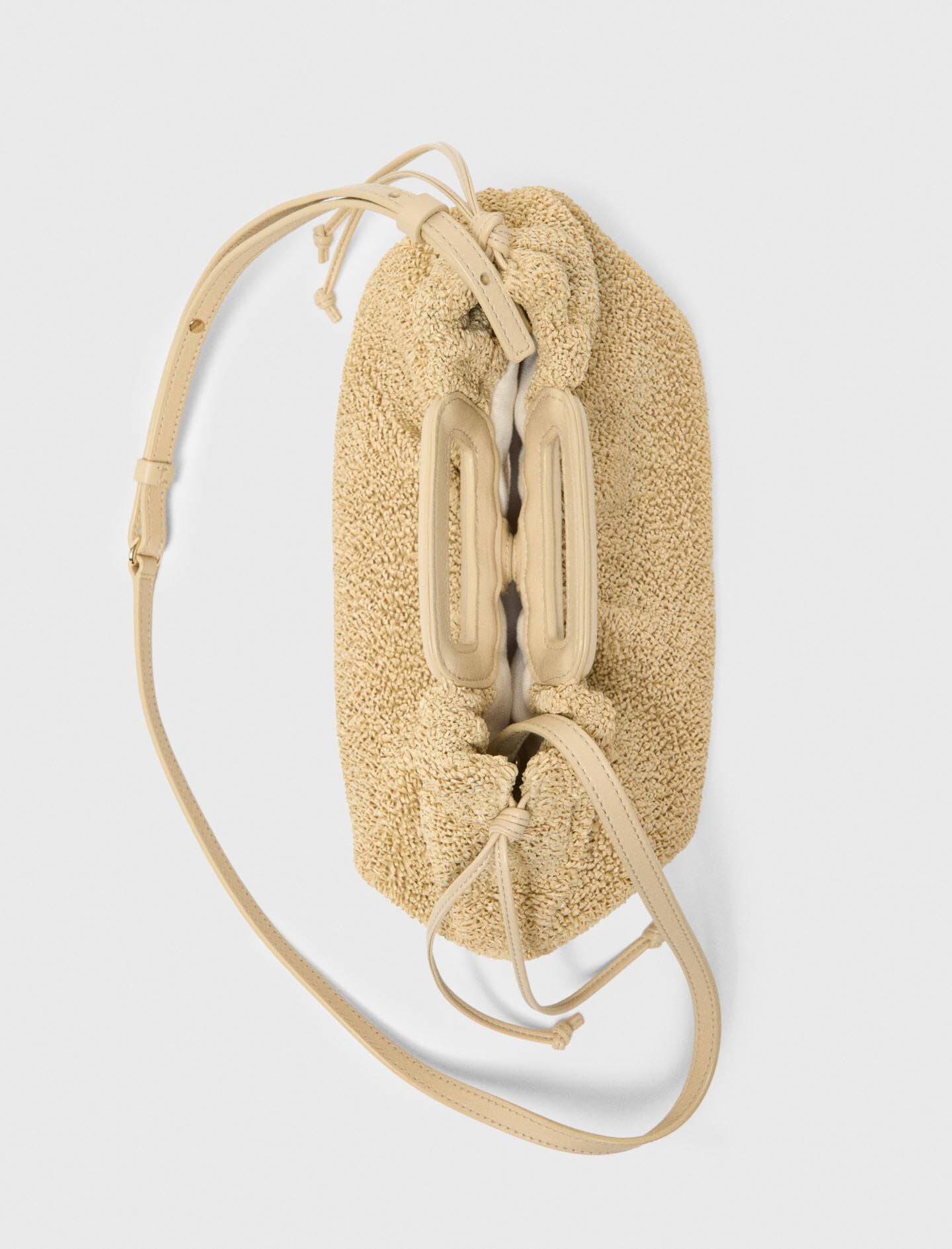 Maje New / Mipli bouclé effect clutch bag