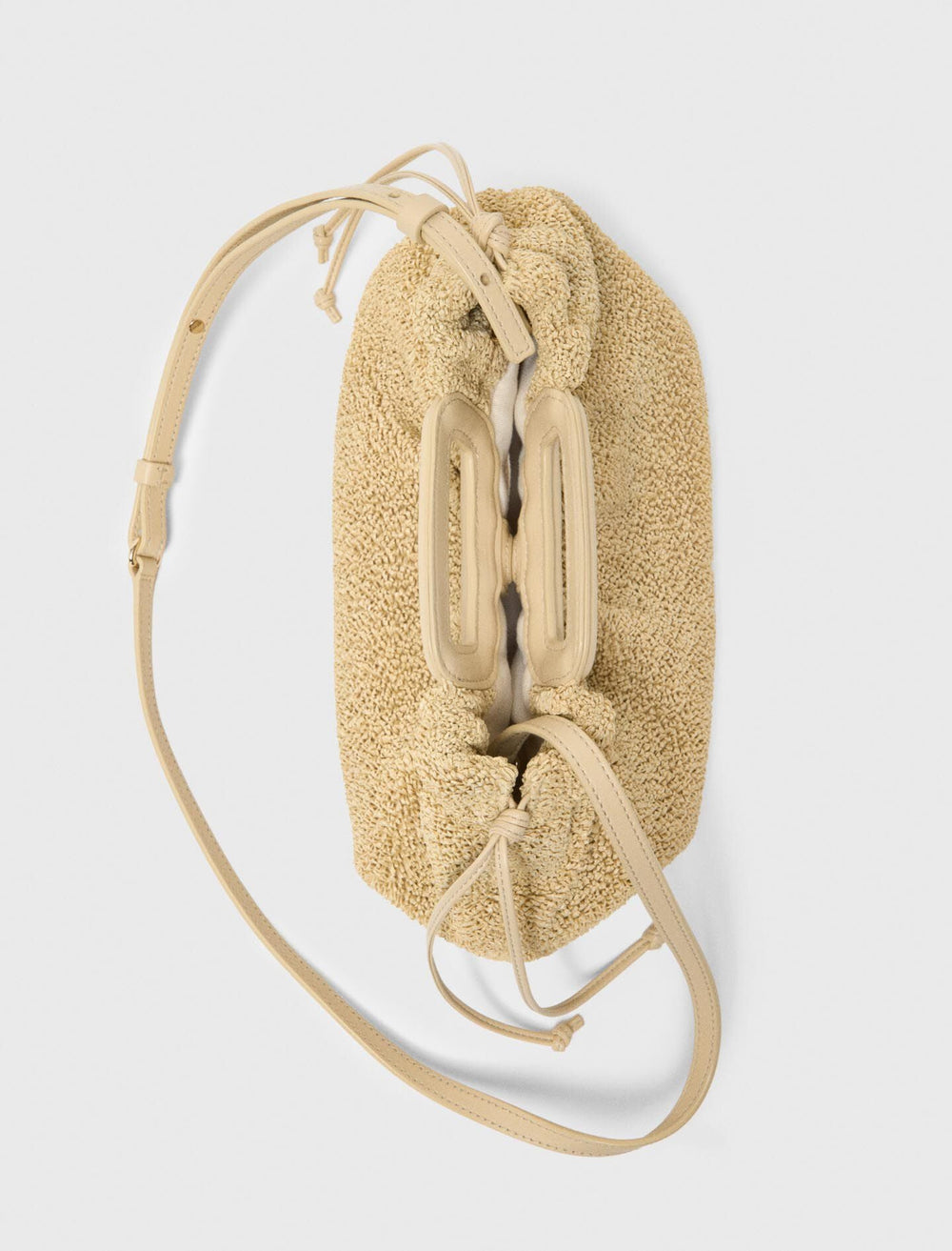 Maje New / Mipli bouclé effect clutch bag